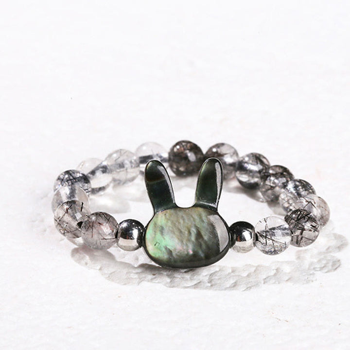Buddha Stones 3mm ブラックルチルクォーツ シャコガイ 石 ウサギ 猫 リング - ウサギ（63mmゴム紐） - image 1