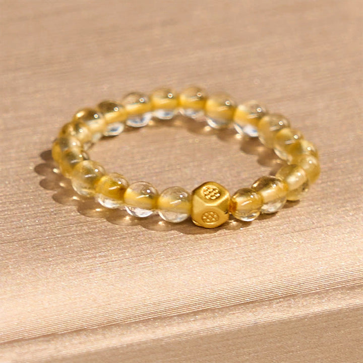 Buddha Stones3mm ゴールデンルチルクォーツビーズ 富の弾性ストリングリング