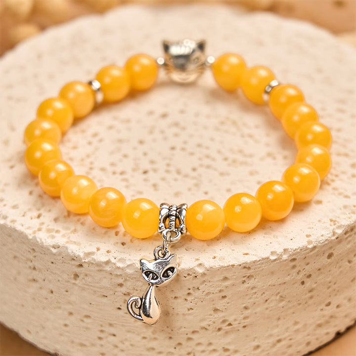 Buddha Stonesオレンジタビーキャット イエローカルセドニー ポジティブブレスレット - image 1