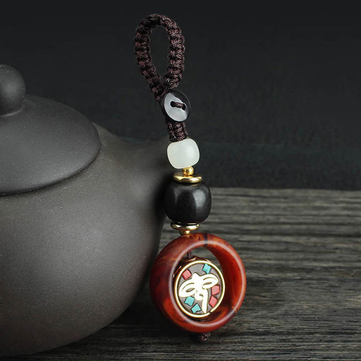 Buddha Stones黒檀四つ葉のクローバー 仏陀の目 平和 回転式キーチェーン - 仏眼模様 - image 6