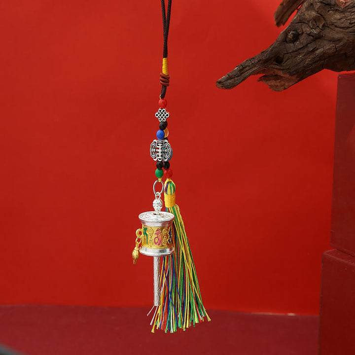Buddha Stonesの祈祷ホイール、オーム・マニ・パドメ・フムのカラフルなタッセル、清浄のキーチェーン - ミディアムゴールド - image 4