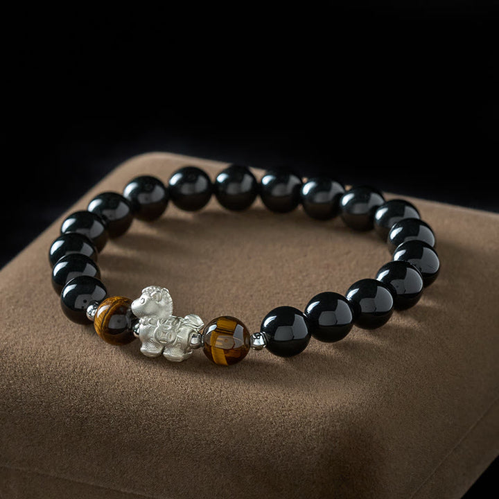 Buddha Stones馬年 999スターリングシルバー 馬チャーム ブラックオブシディアン タイガーアイ強さブレスレット - 10mm - image 0