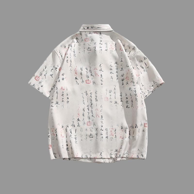 Buddha Stones カリグラフィープリント柄メタルバーフロッグクロージャーデザイン半袖メンズシャツポケット付き - image 1