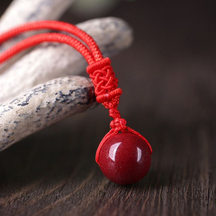 Buddha Stones 辰砂の悪霊除けネックレスペンダント - image 0