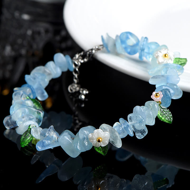 Buddha Stones 天然アクアマリン、ペリドット、ストロベリークォーツ、各種クリスタルを使用したセレニティブレスレット - image 1