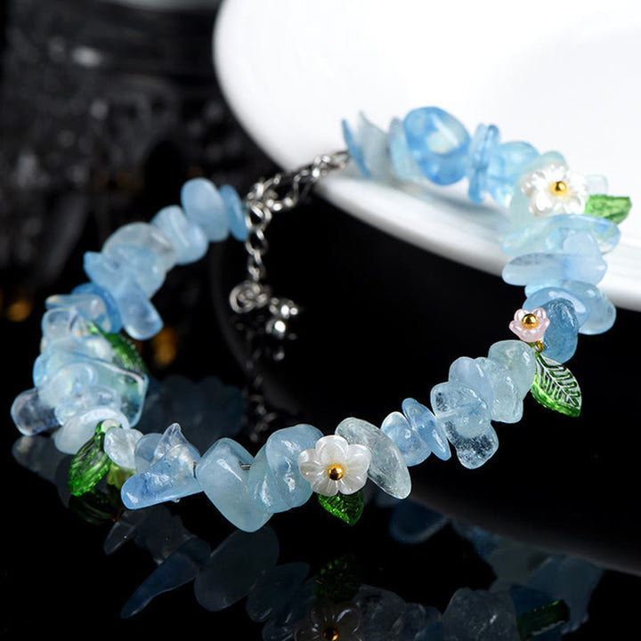 Buddha Stones 天然アクアマリン、ペリドット、ストロベリークォーツ、各種クリスタルを使用したセレニティブレスレット - image 1