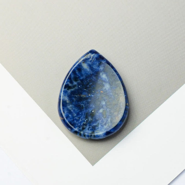 Buddha Stones ティアドロップ型お守りクリスタル装飾石 34×26×7.8cm - 天然ソーダライト（色味は個体差があります） - 34×26×7.8mm - image 11