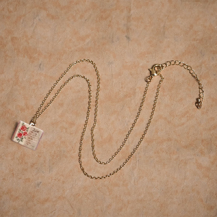 Buddha Stones 銅製誕生花強化ブックデザインバランスペンダントネックレス - image 3