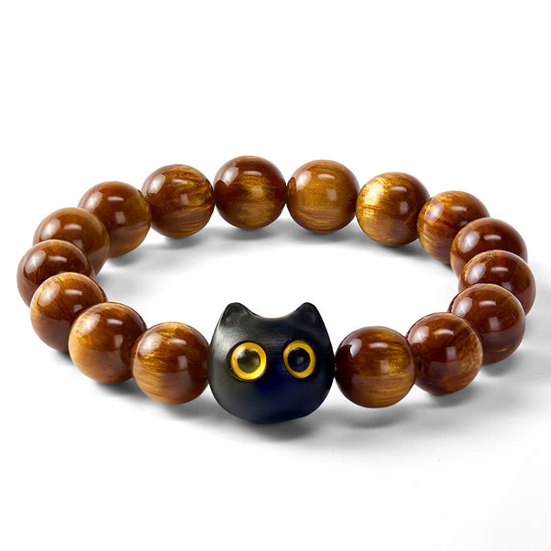 Buddha Stones 黄色の樹脂ビーズ、黄色の目、黒檀猫モチーフの落ち着いたブレスレット - image 6