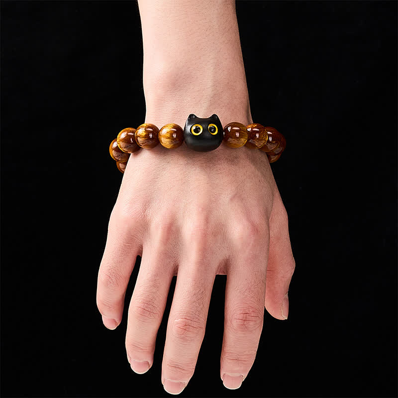 Buddha Stones 黄色の樹脂ビーズ、黄色の目、黒檀猫モチーフの落ち着いたブレスレット - image 4