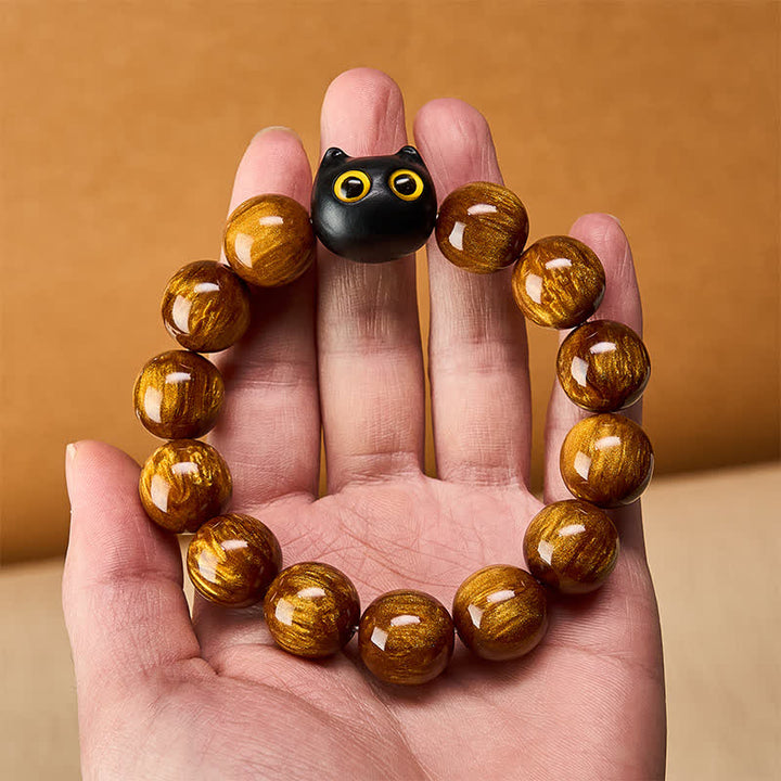 Buddha Stones 黄色の樹脂ビーズ、黄色の目、黒檀猫モチーフの落ち着いたブレスレット - image 13