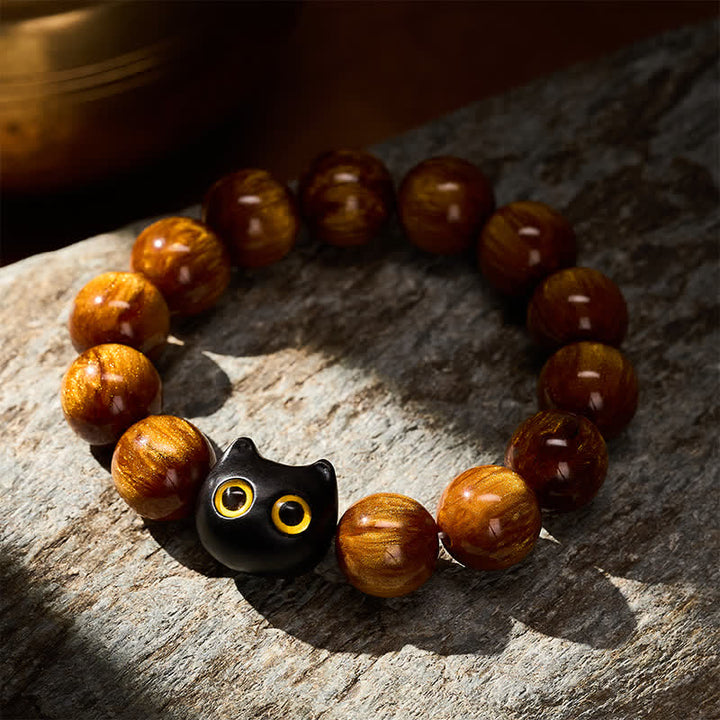 Buddha Stones 黄色の樹脂ビーズ、黄色の目、黒檀猫モチーフの落ち着いたブレスレット - image 12