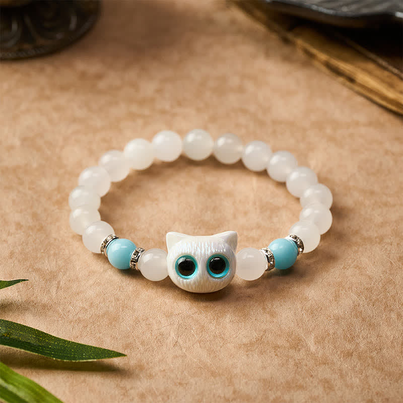 Buddha Stones ホワイトジェイドとブラックオブシディアンを使った猫の頭モチーフのピュリティビーズブレスレット - image 8