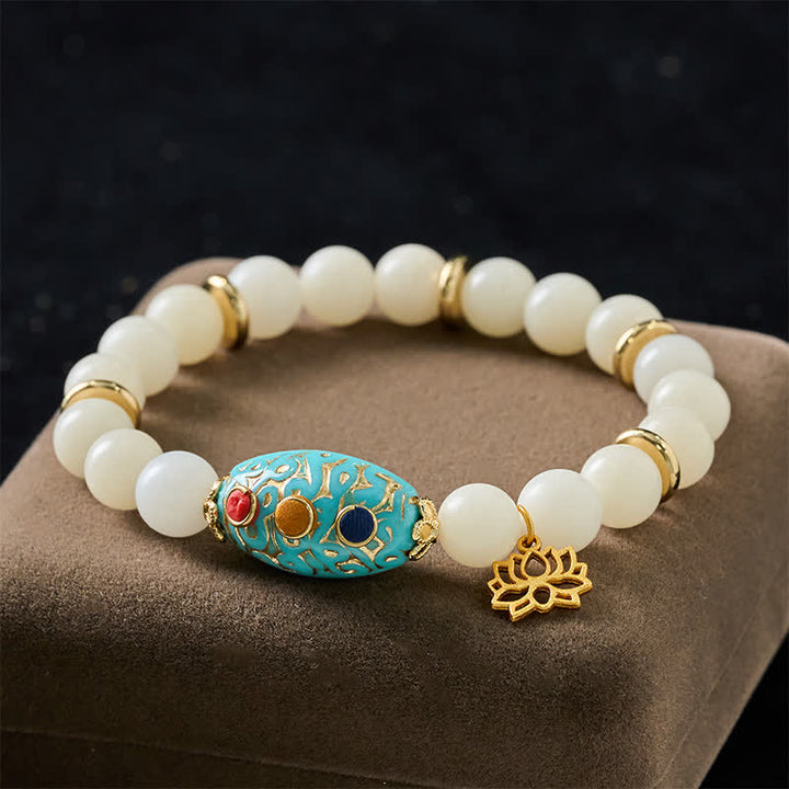 Buddha Stones 菩提樹の種とターコイズを使った蓮の悟りのブレスレット - 菩提樹の種（知恵♥平和） - image 0