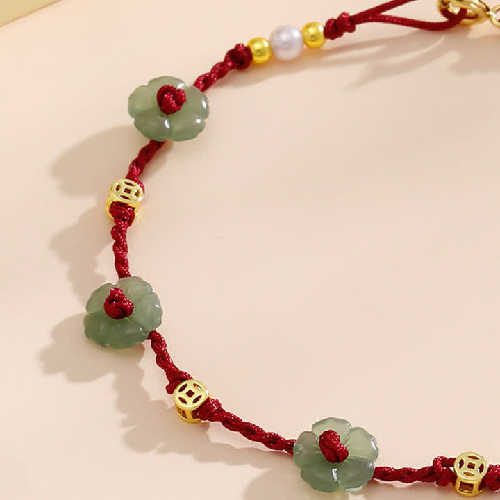 Buddha Stones 手織りの赤紐で作られた、花柄のチャームが付いたお守りアンクレット - image 9