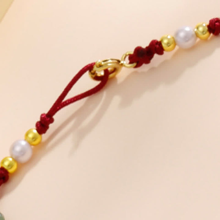 Buddha Stones 手織りの赤紐で作られた、花柄のチャームが付いたお守りアンクレット - image 11