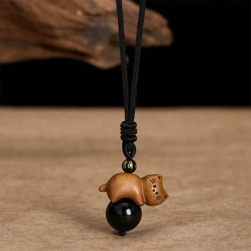 Buddha Stones 白檀の猫、黒曜石のビーズ、オーム・マニ・パドメ・フム・フムのビーズ、保護ロープネックレス - サンダルウッド＆ブラックオブシディアン - image 0