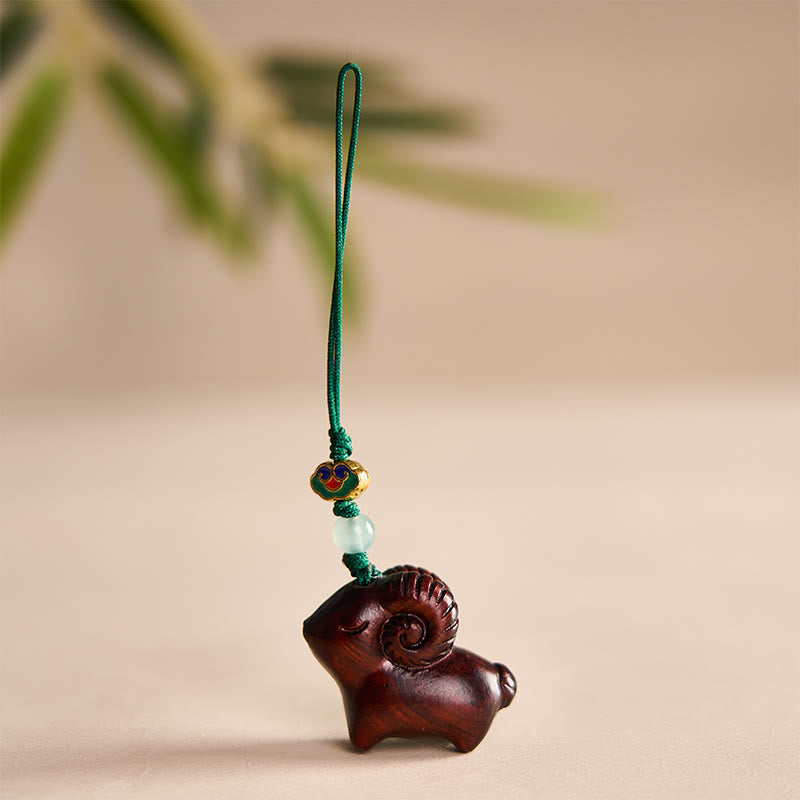 Buddha Stones 手彫りの白檀製ヤギのポジティブキーホルダー - 濃い赤色 - image 14