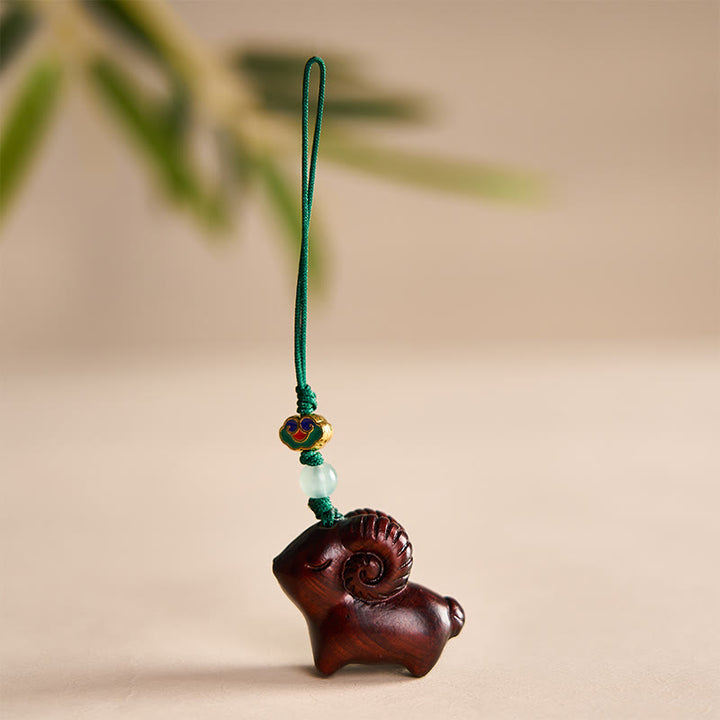 Buddha Stones 手彫りの白檀製ヤギのポジティブキーホルダー - 濃い赤色 - image 14