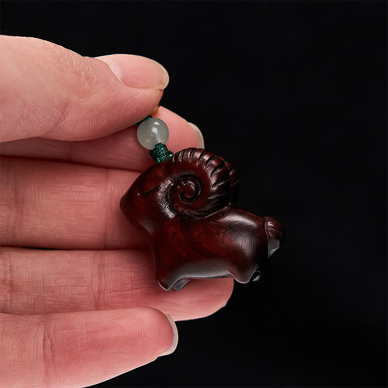 Buddha Stones 手彫りの白檀製ヤギのポジティブキーホルダー - image 19
