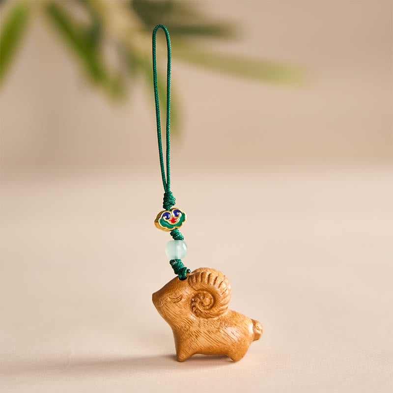 Buddha Stones 手彫りの白檀製ヤギのポジティブキーホルダー - 黄色 - image 7