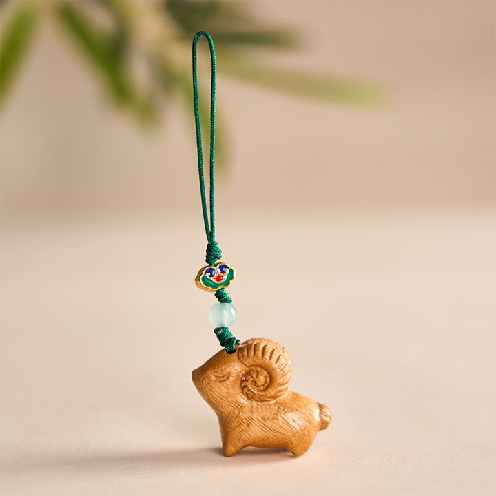 Buddha Stones 手彫りの白檀製ヤギのポジティブキーホルダー - 黄色 - image 7