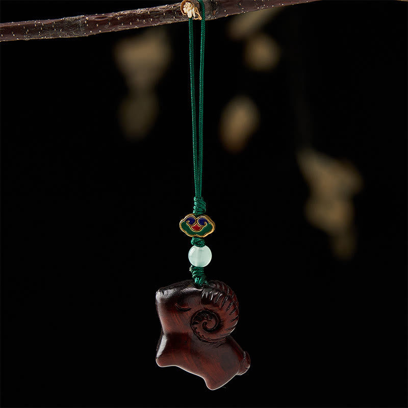 Buddha Stones 手彫りの白檀製ヤギのポジティブキーホルダー - image 16