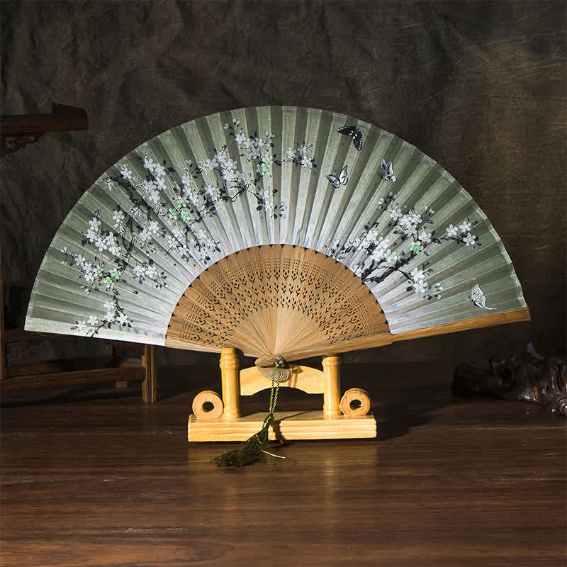 Buddha Stones 竹製蝶桜折りたたみ扇子 - 緑色の表面（タッセル付き） - image 1