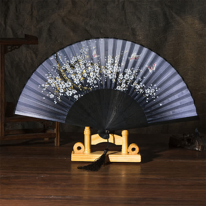 Buddha Stones 竹製蝶桜折りたたみ扇子 - 黒地表面にピンクの蝶（タッセル付き） - image 4