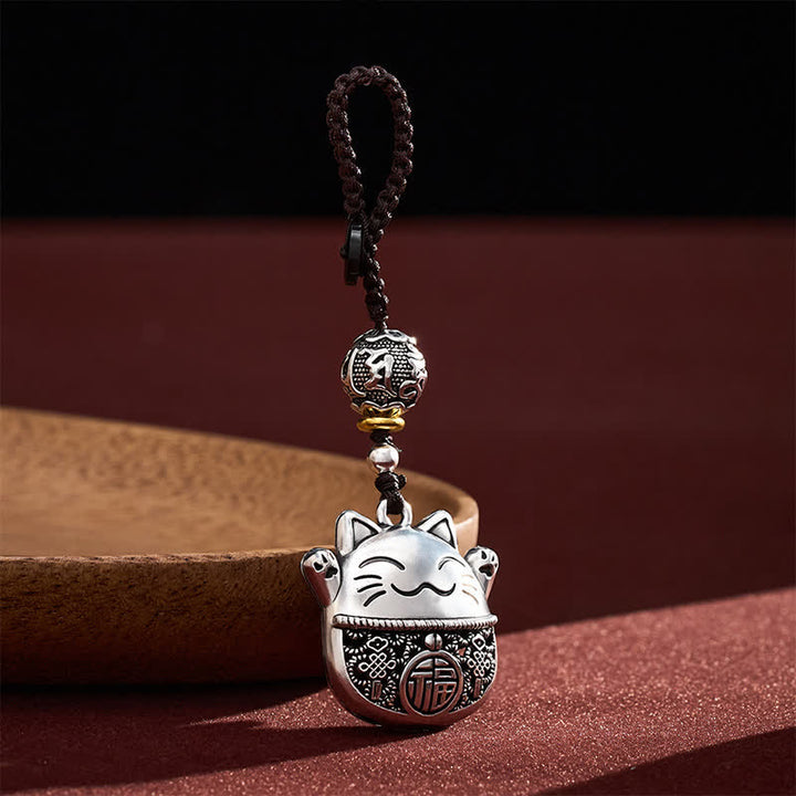 Buddha Stones 銅製「福」の文字が刻印された招き猫の編み込みバランスキーホルダー - image 1