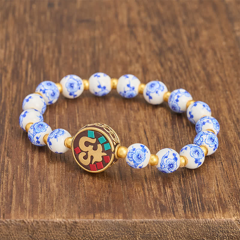 Buddha Stones 青と白の磁器製銅製OM慈悲のビーズブレスレット - image 1