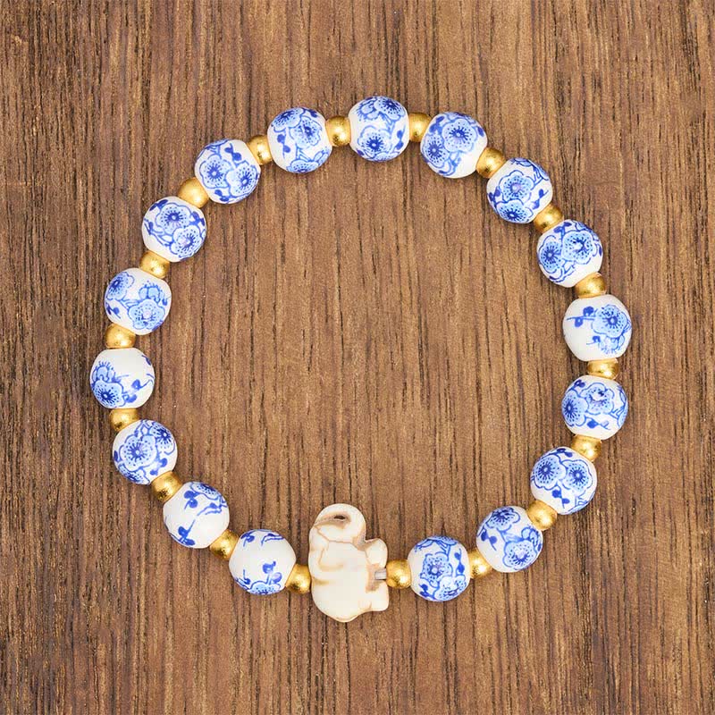Buddha Stones 白い磁器製の象と花柄の丸いビーズブレスレット - image 1