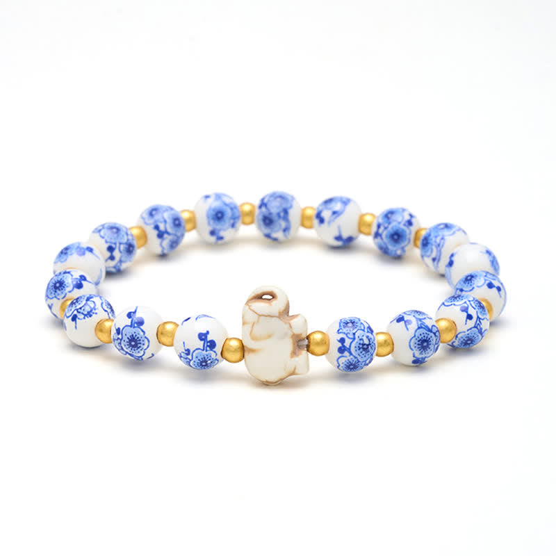Buddha Stones 白い磁器製の象と花柄の丸いビーズブレスレット - 象（力強さ♥知恵） - image 0