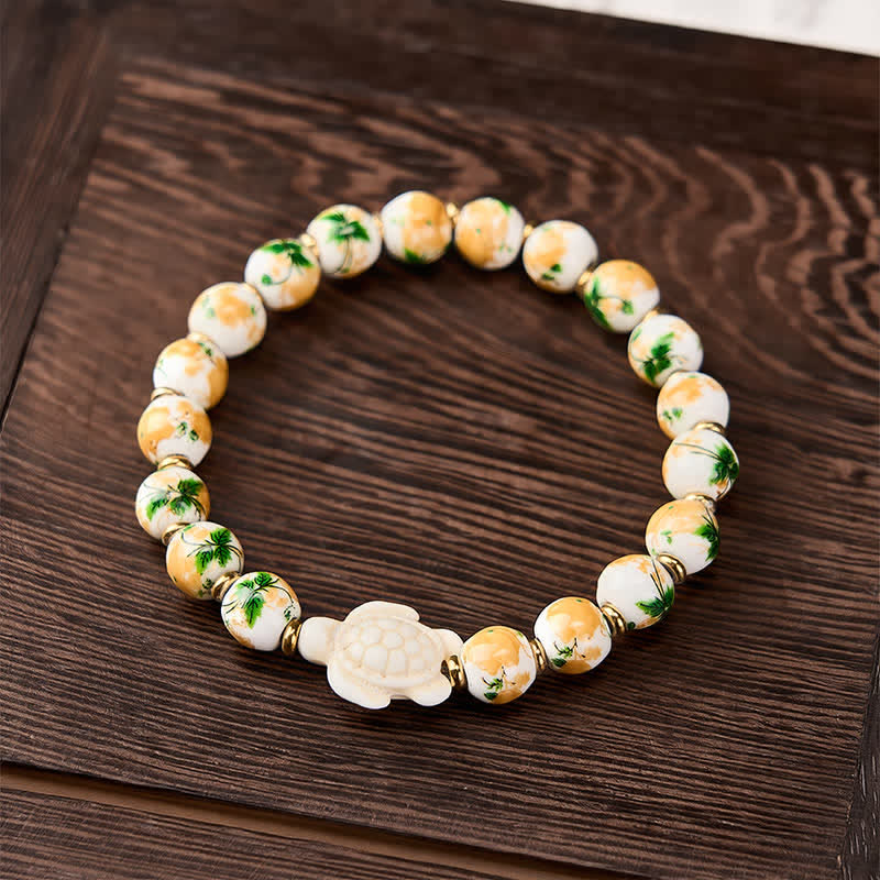 Buddha Stones 天然ホワイトターコイズ製亀のデザインの開運財運ブレスレット - image 1