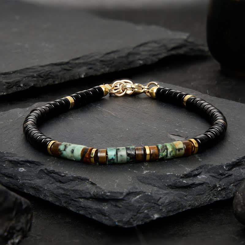 Buddha Stones ブラックオニキスとターコイズの保護ラウンドビーズブレスレット - image 1