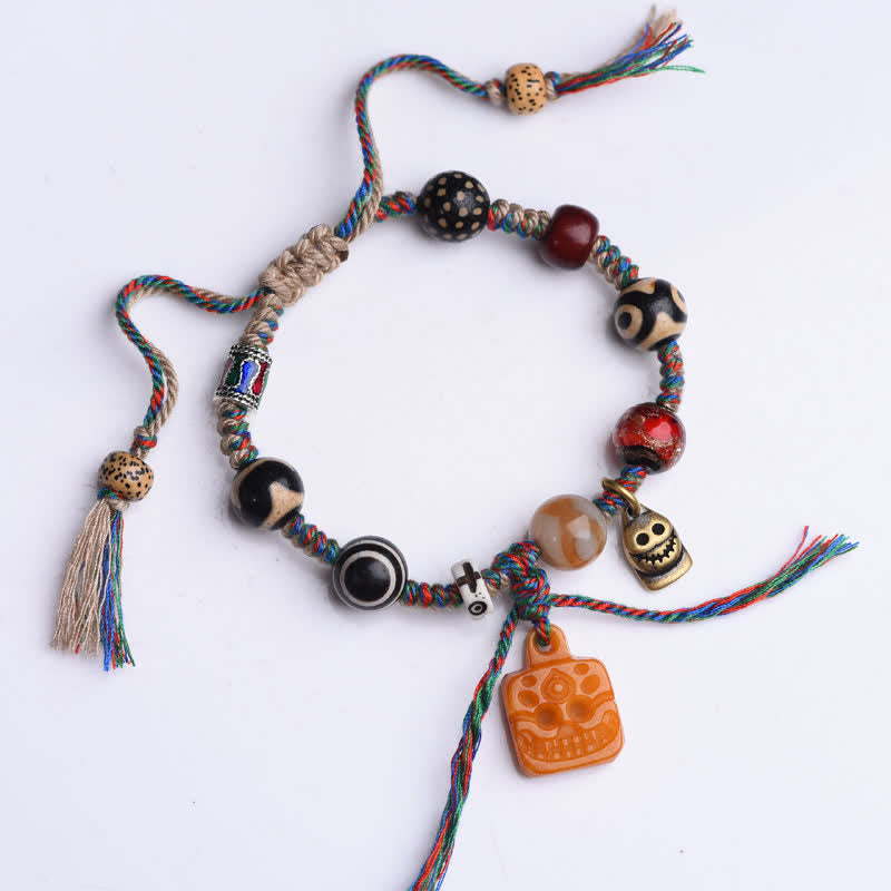 Buddha Stones チベットのジービーズと骨を編み込んだマルチカラーストリングの祝福ブレスレット - image 1