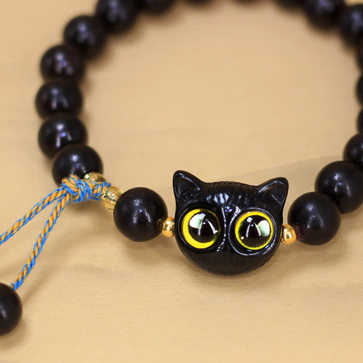 Buddha Stones 黒檀の猫チャーム付き編み込みラウンドバランスブレスレット - image 4