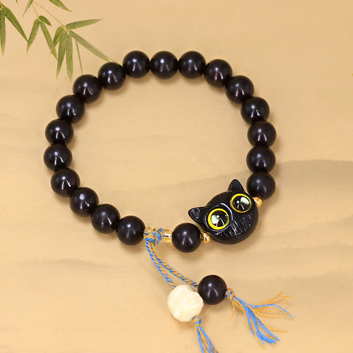 Buddha Stones 黒檀の猫チャーム付き編み込みラウンドバランスブレスレット - image 1