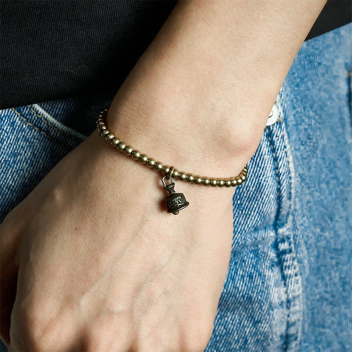 Buddha Stones 銅ビーズのベルペンダント付きバランスブレスレット - 7.1～7.5インチ（18～19cm） - image 0