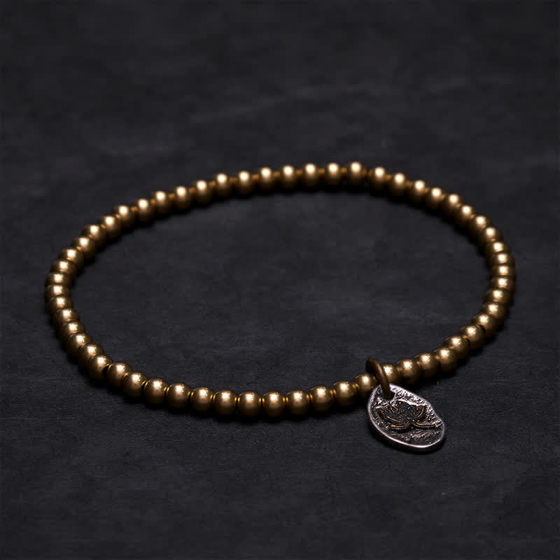 Buddha Stones 銅ビーズの蓮のチャーム付きヒーリングブレスレット - image 1