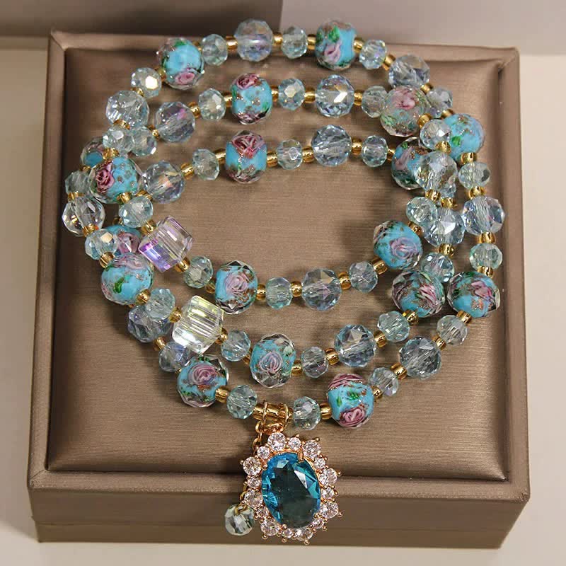 Buddha Stones ブルーリュリガラスビーズ花柄オーバルチャームトリプルラップクラリティブレスレット - image 1