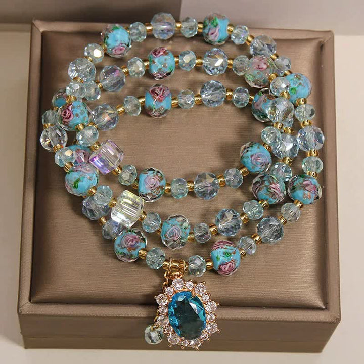 Buddha Stones ブルーリュリガラスビーズ花柄オーバルチャームトリプルラップクラリティブレスレット - image 1