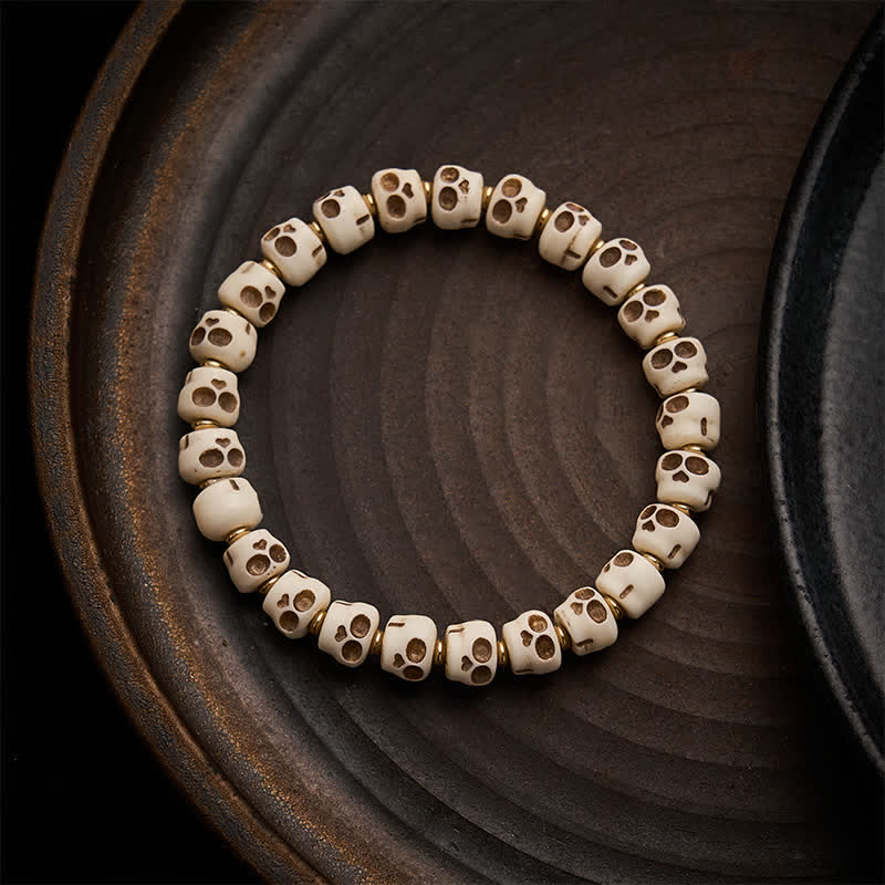 Buddha Stones チベットの骨ビーズ　屍の王の森の頭蓋骨模様　守護と勇気のブレスレット - 9 × 6.3mm - image 0