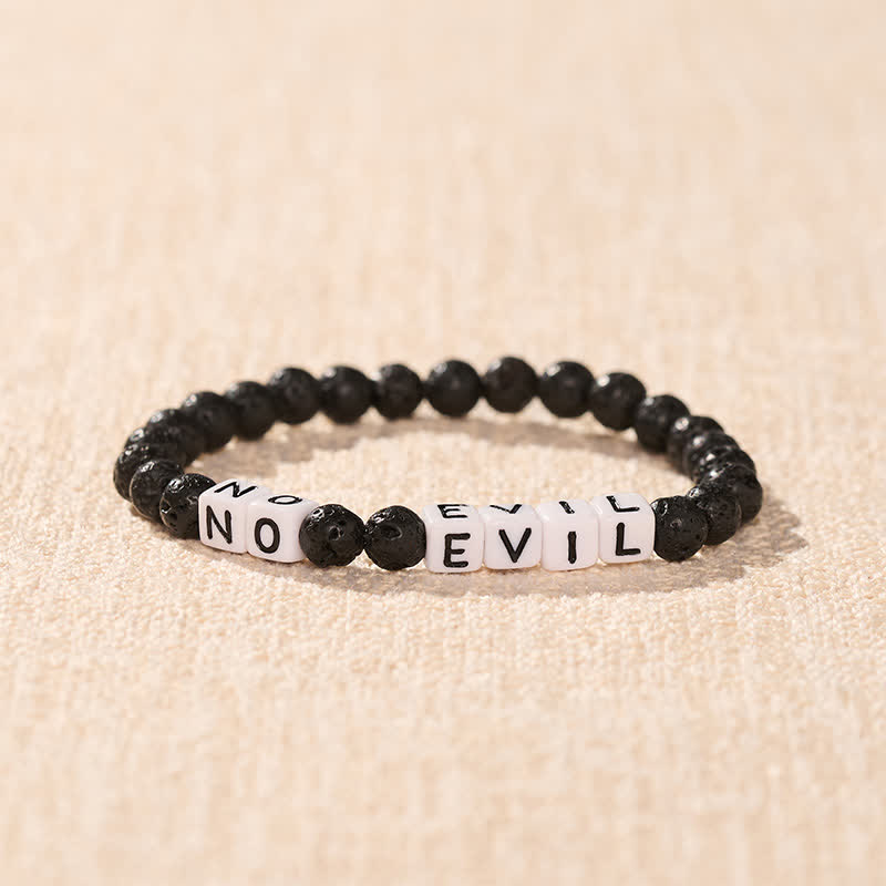 Buddha Stones 溶岩石「NO EVIL」の文字入り丸ビーズヒーリングブレスレット - image 1