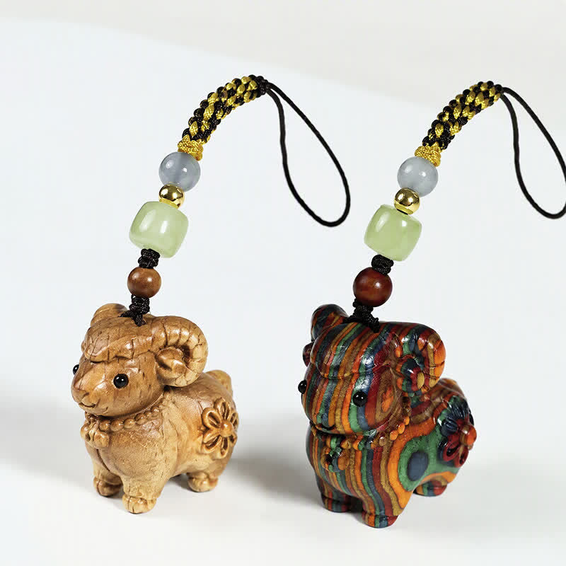 Buddha Stones レインボーユーカリとサンダルウッドを使用した、ヤギの静寂をモチーフにした手彫りキーホルダー - image 0