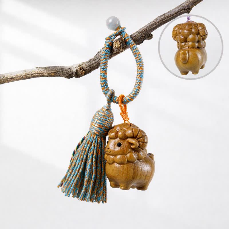 Buddha Stones 手彫りの緑白檀製レインボーユーカリヤギの幸運のタッセルキーホルダー - グリーンサンダルウッド - オレンジブルー - image 1