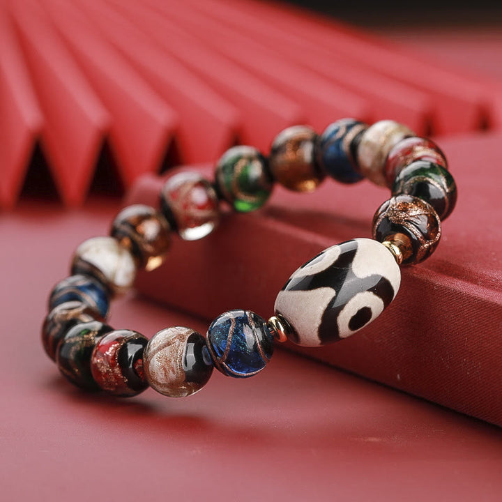 Buddha Stonesチベット九眼珠三眼珠琉璃ガラス玉富のブレスレット