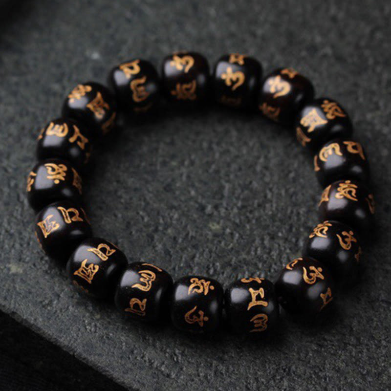 Buddha Stonesチベット黒檀オーム・マニ・パドメ・フム彫刻 平和ブレスレット