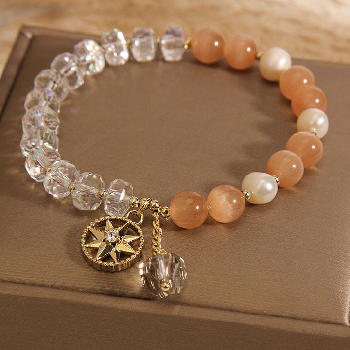 Buddha Stonesオレンジキャッツアイ ホワイトクリスタル スターサポートブレスレット