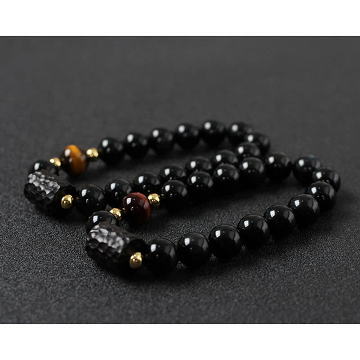 黒曜石、黒檀、赤虎目石の強さを秘めたカップルブレスレット